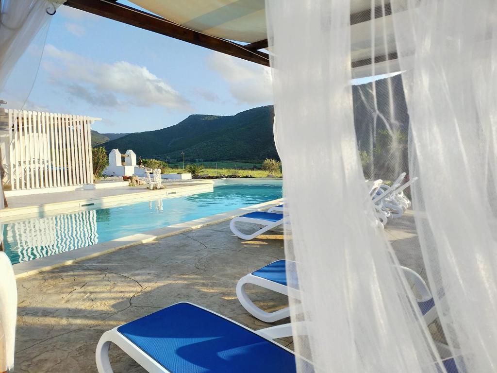 Tutta Colpa del Paradiso in Sardegna | Porto Pino - Частные дома и виллы - Sardegna del Sud