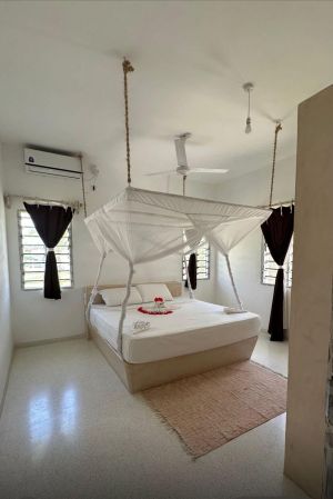 Mwezi House |  -  - 
